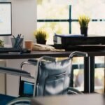 Employee with workplace disability accommodation with accessible office setup