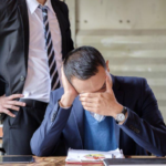 Workplace sexual harassment in Illinois showing employee reporting inappropriate behavior to HR manager