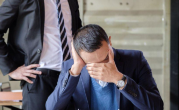 Workplace sexual harassment in Illinois showing employee reporting inappropriate behavior to HR manager