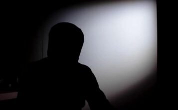 Employee anonymously reporting workplace misconduct as a whistleblower